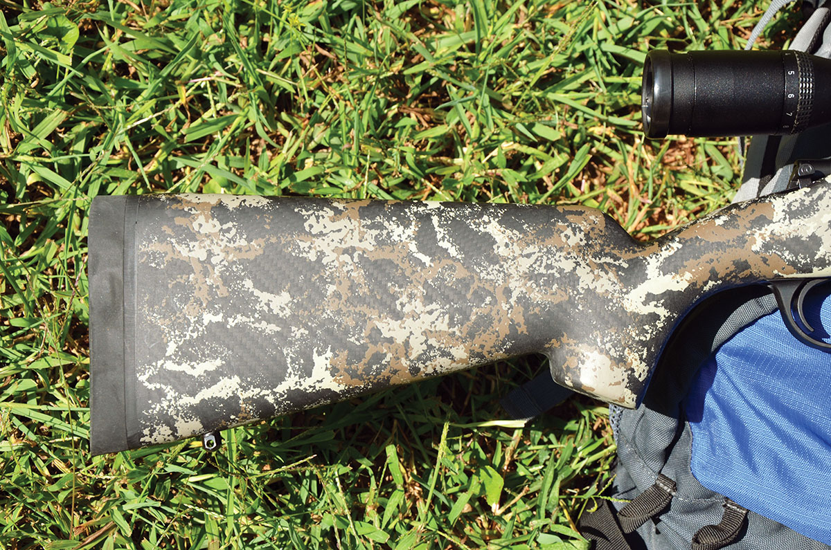 The carbon fiber stock made by AG Composites has a one-inch Pachmayr Decelerator recoil pad, and it weighs 28.5 ounces. Quite trim, it measures five inches around the small of its grip and 3.75 inches around the center of its forearm. Several finish colorations are available.